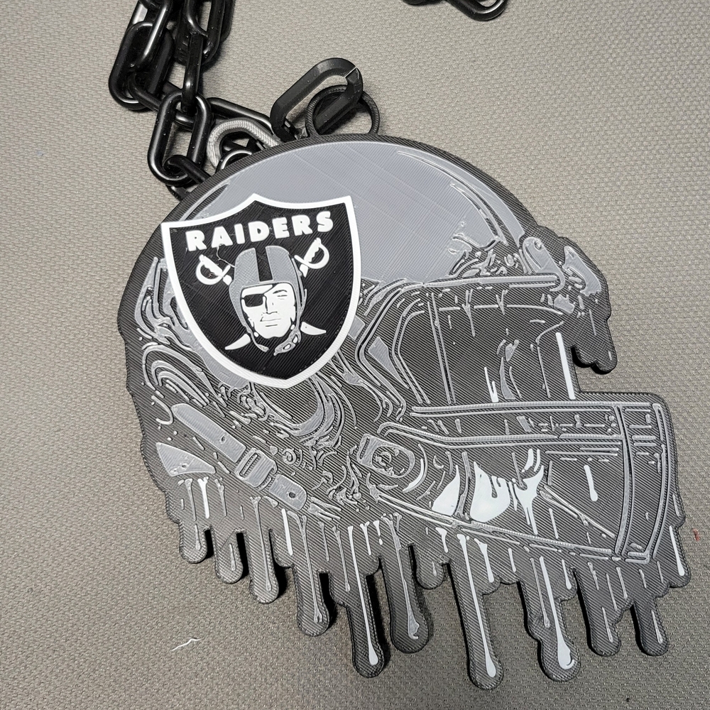 Raiders Dripping Helmet Keychain
